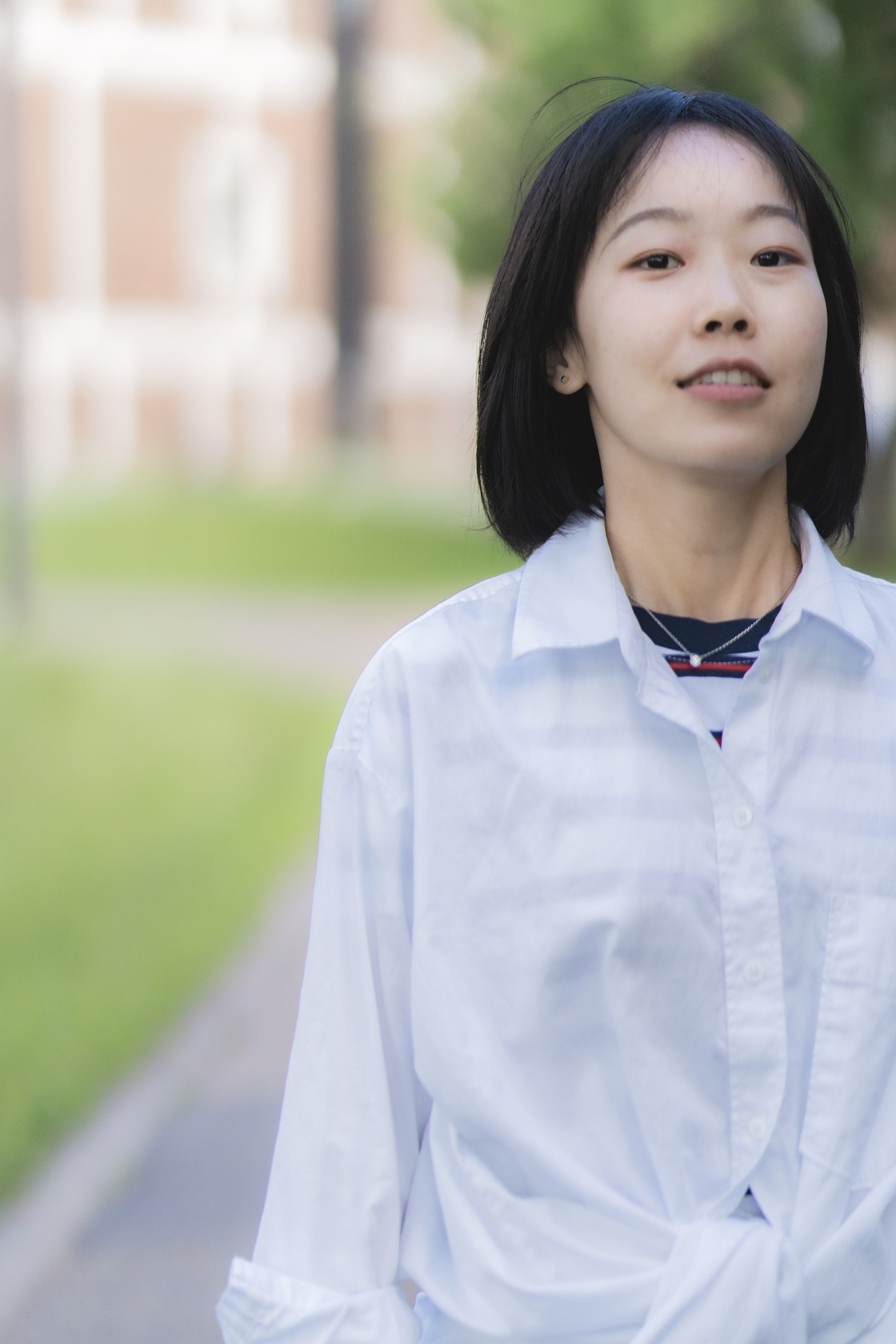 a female model in button-up shirt