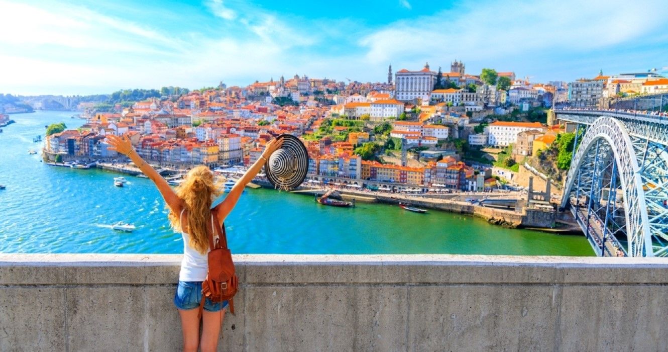 Happy traveler in Porto, Portugal