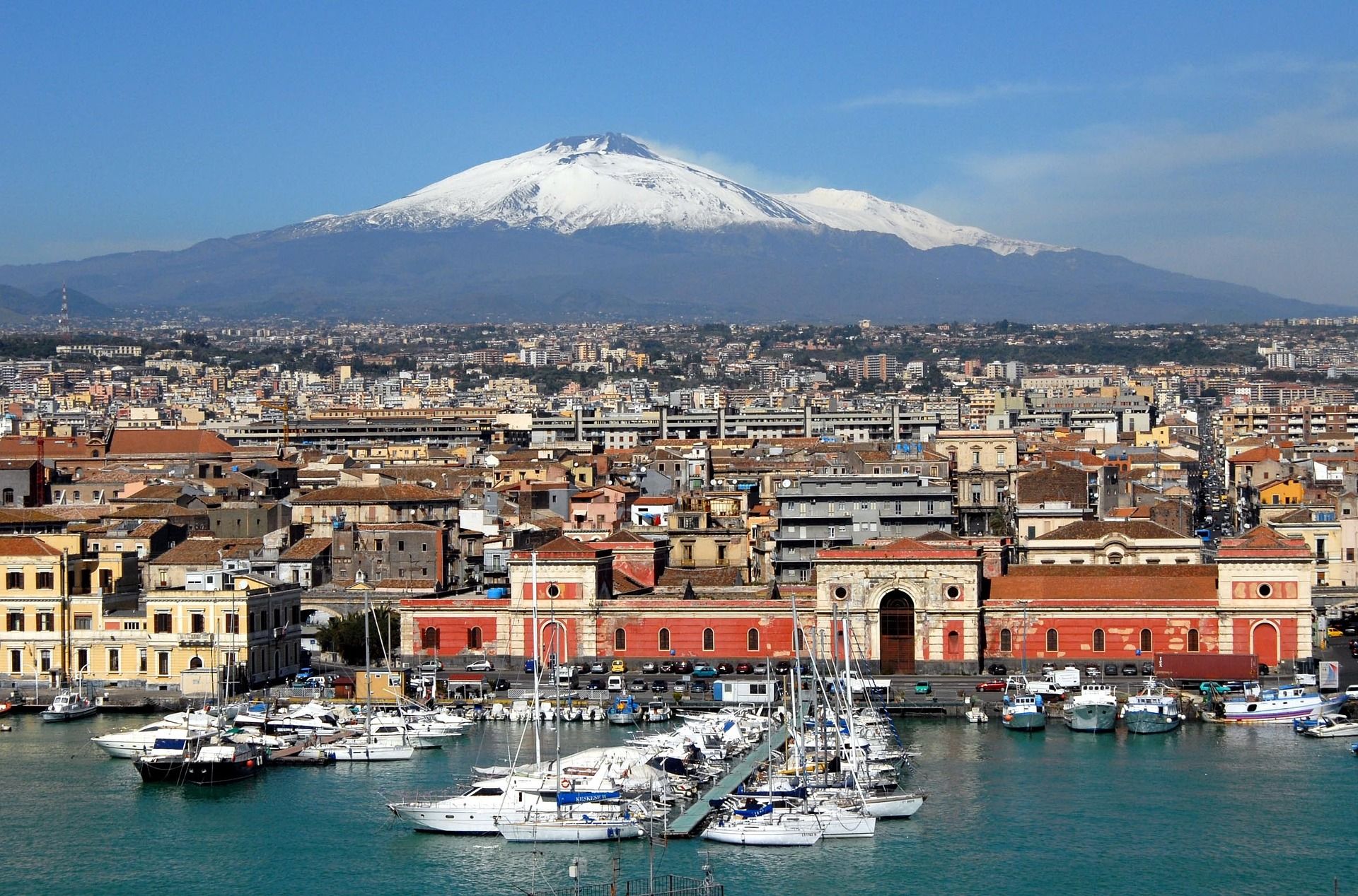 A view of Catania in Italy with Mount Etna in the background