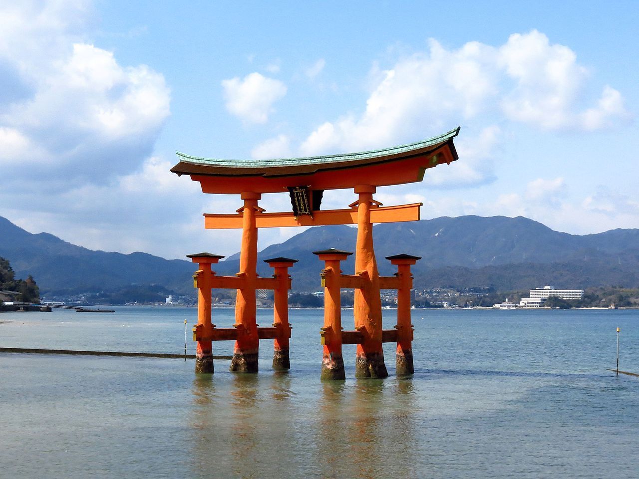 Itsukushima shrine, floating gate in sea with a mountainous backdrop, Hiroshima