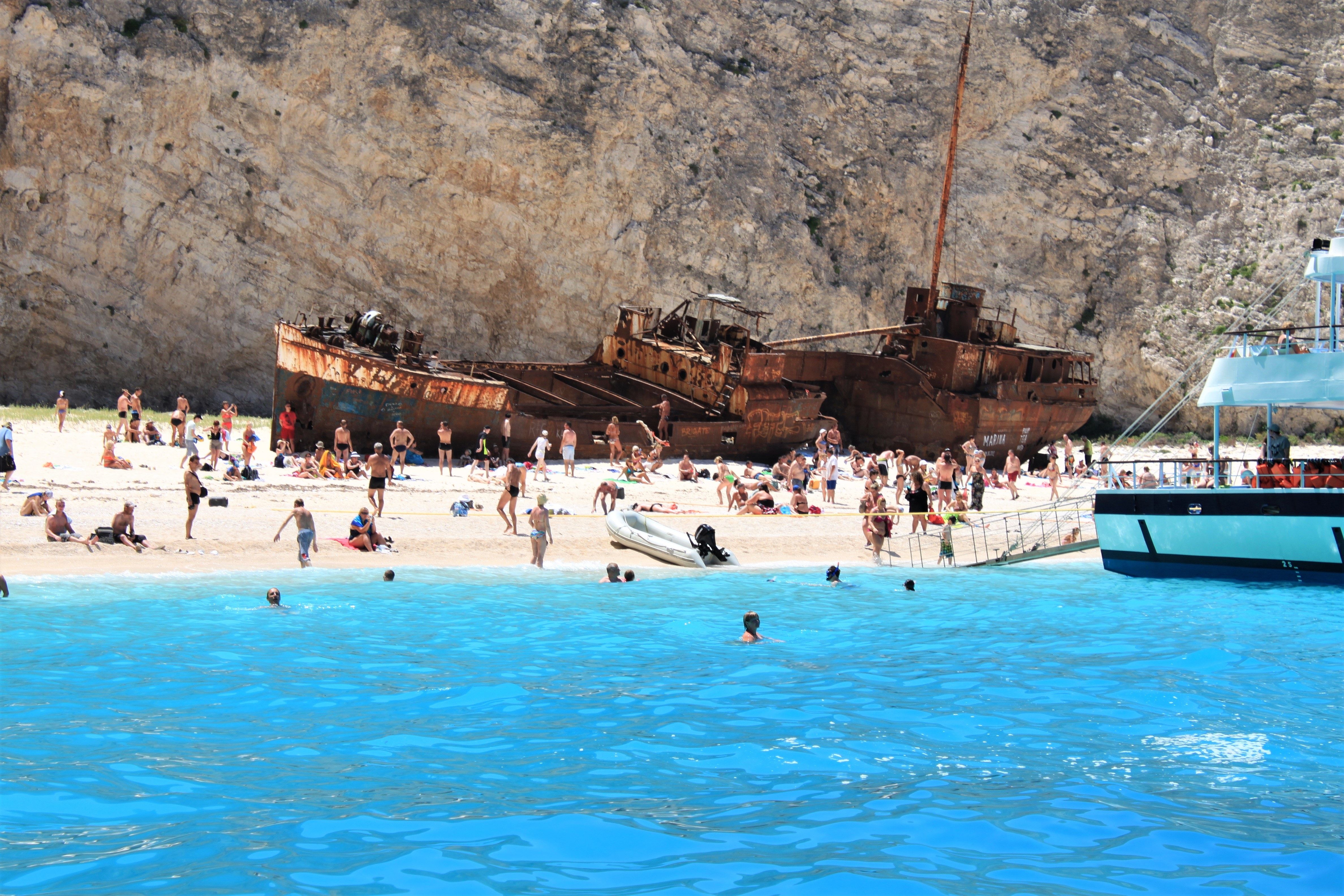 People at Shipwreck Beach, Zakinthos, Greece