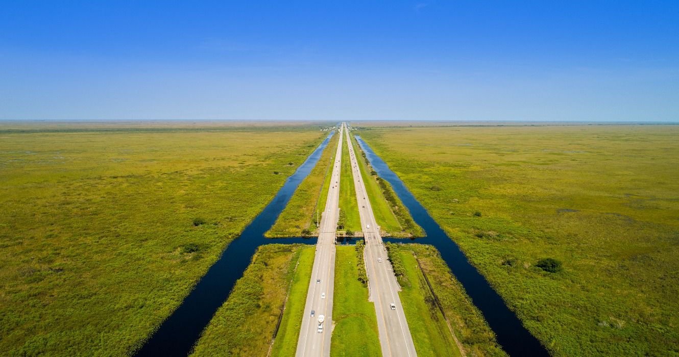 An aerial view of a section of the Alligator Alley road trip route, Florida Everglades, I75 road, USA