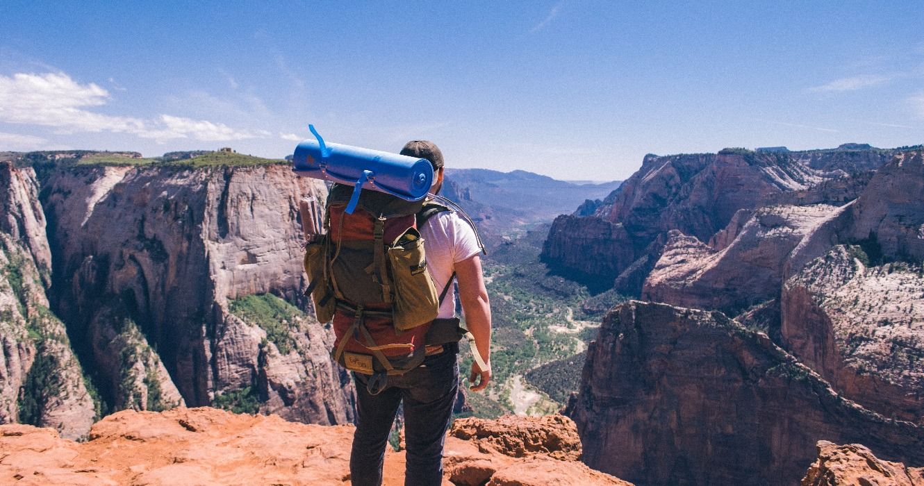 A backpacker looking over Zion National Park, Utah, United States
