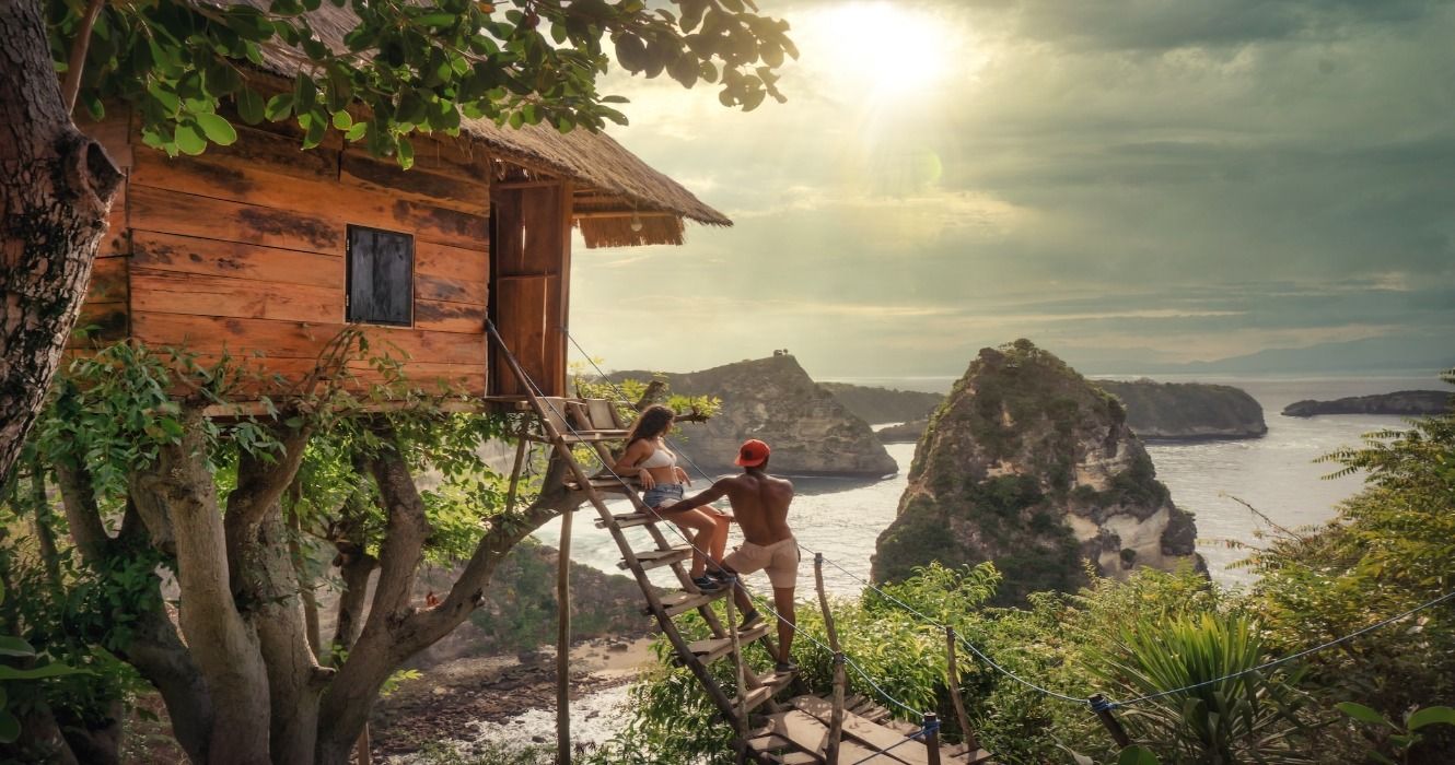 A couple at Rumah Pohon Treehouse on Nusa Penida Island in Bali, Klungkung Regency, Indonesia
