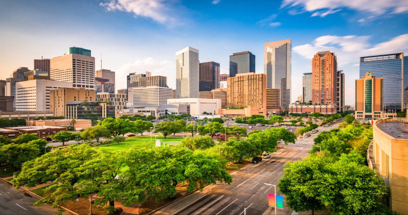 Downtown Houston city skyline over Root Square in Houston, Texas, USA
