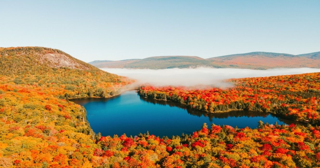 Wachipauka Pond and Webster Slide Mountain amid fall foliage in the autum along the Appalachian Trail in New Hampshire, New England, USA