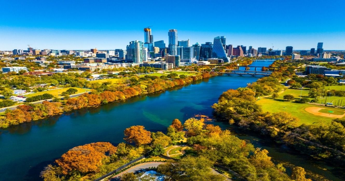Fall foliage in the autumn along the Colorado River in Town Lake, downtown Austin, Texas, USA