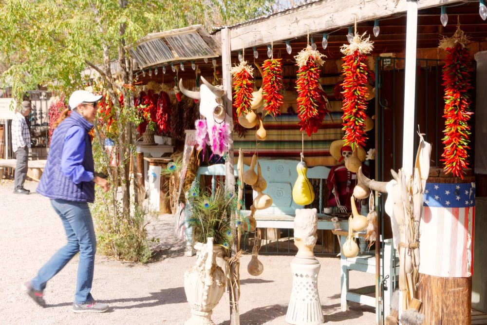 Tourist looking at the ristras hanging