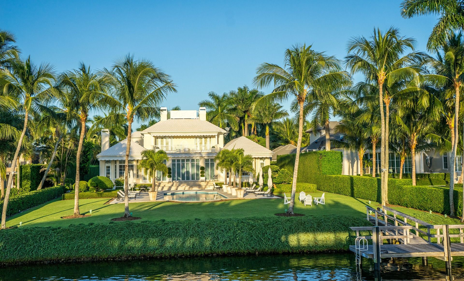 A beautiful house surrounded by palm trees in Naples, Florida 