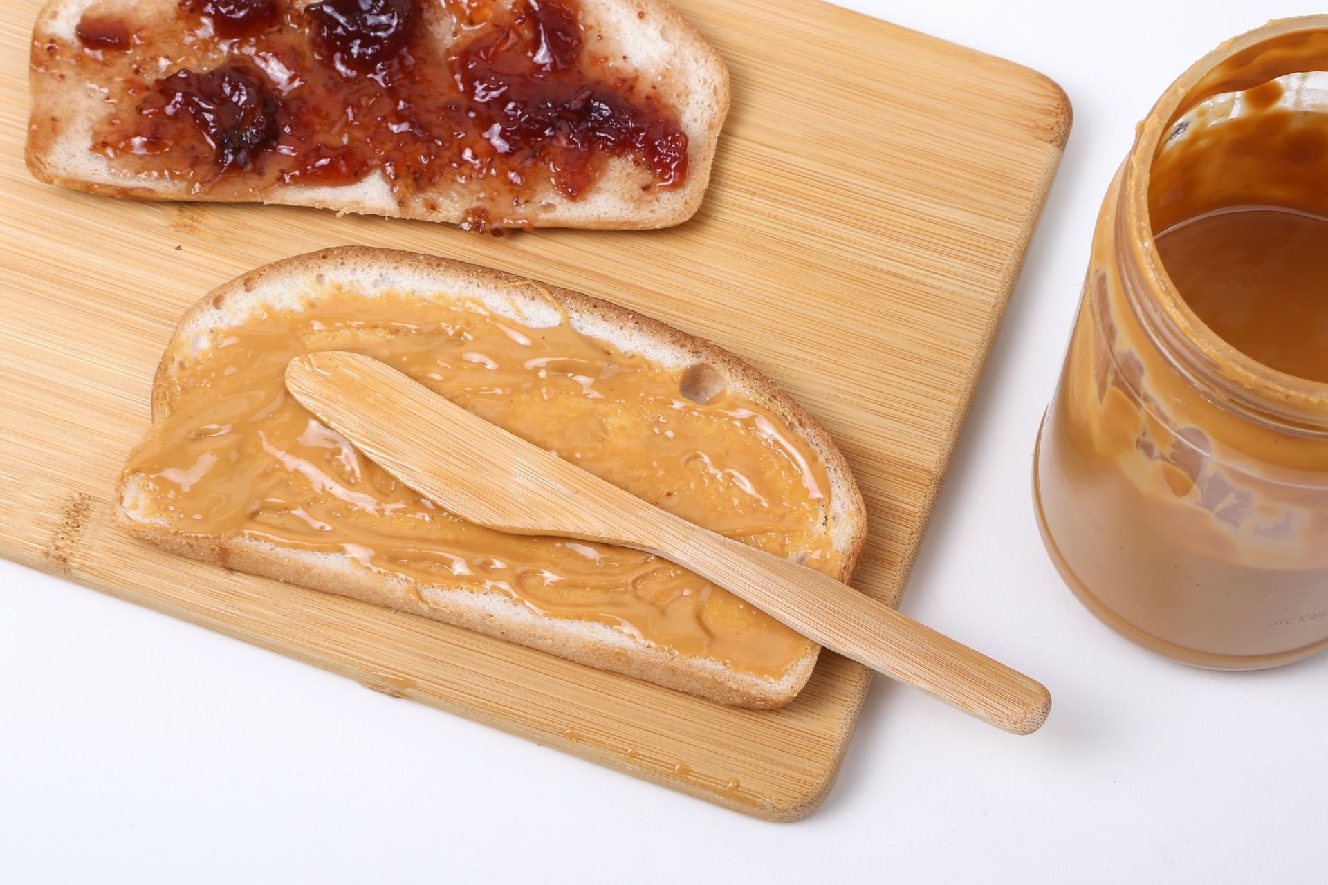 Peanut butter and jelly toast on a cutting board