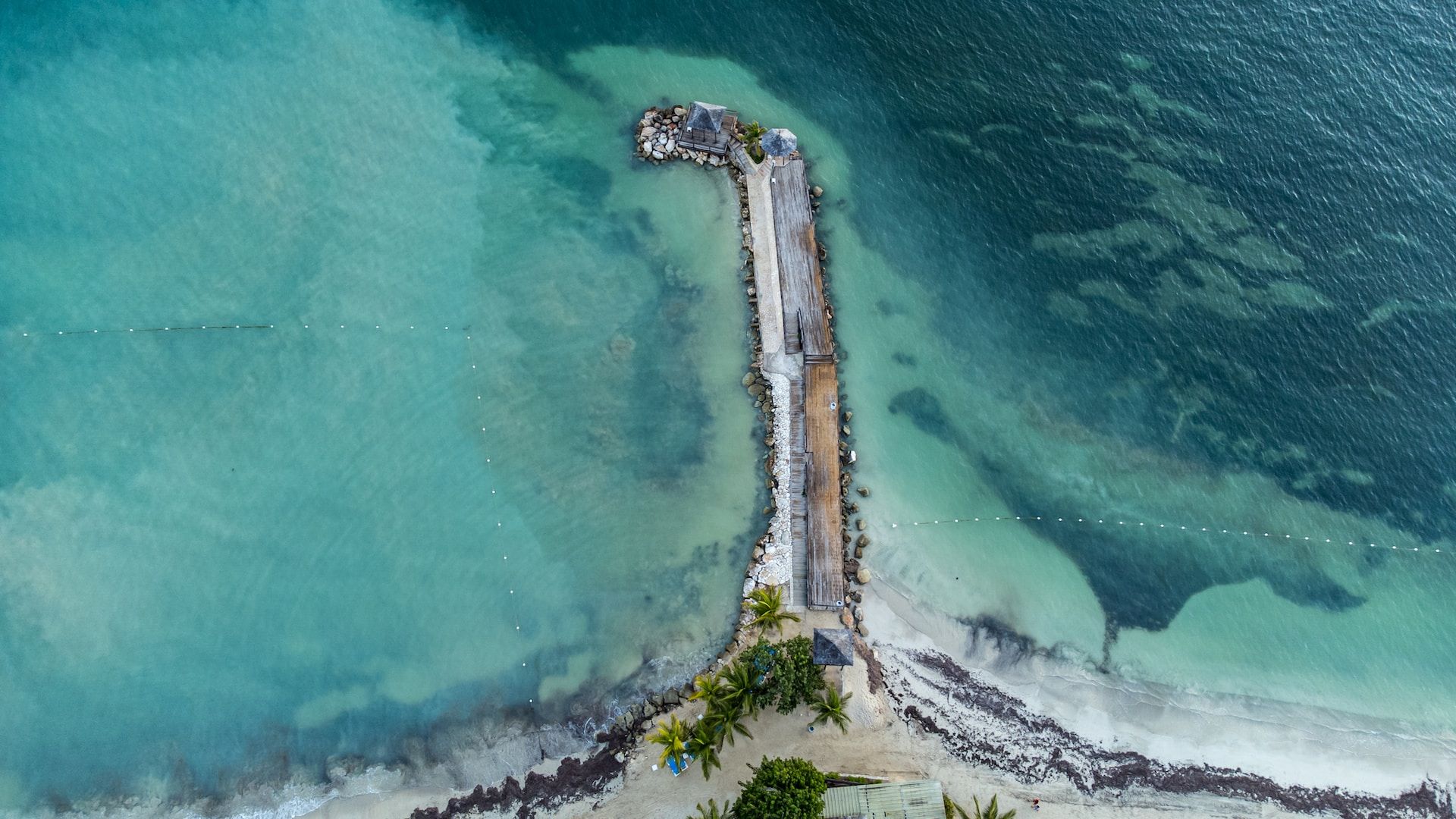 An aerial view of a pier in the ocean in Montego Bay, Jamaica