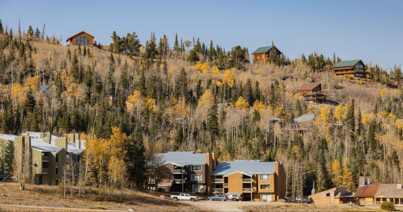 A view of buildings and fall foliage in the autumn in the Brian Head area of Utah, USA