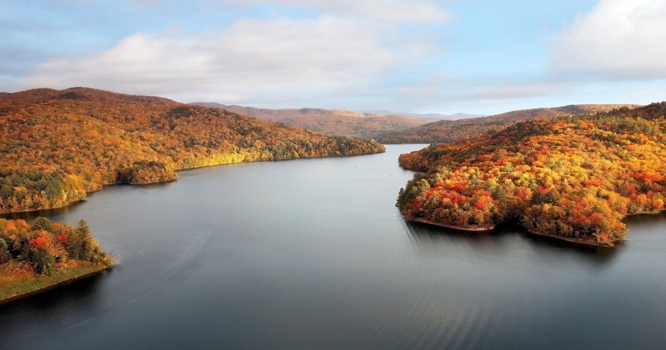 A view of fall foliage in the autumn at the Waterbury Reservoir near  Waterbury, Vermont, USA