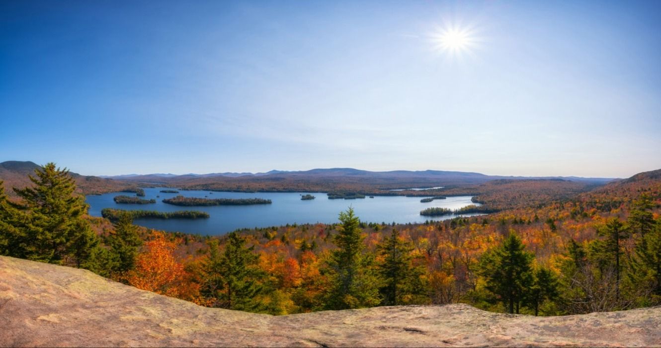 Fall foliage in the autumn surrounding Tupper seen from Castle Rock, the Adirondack Mountains, Adirondacks, New York, NY, USA