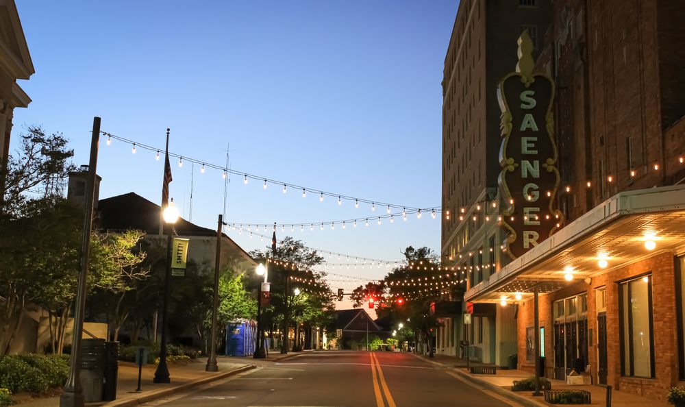 A historic theater with lights in the evening in Hattiesburg, Mississippi