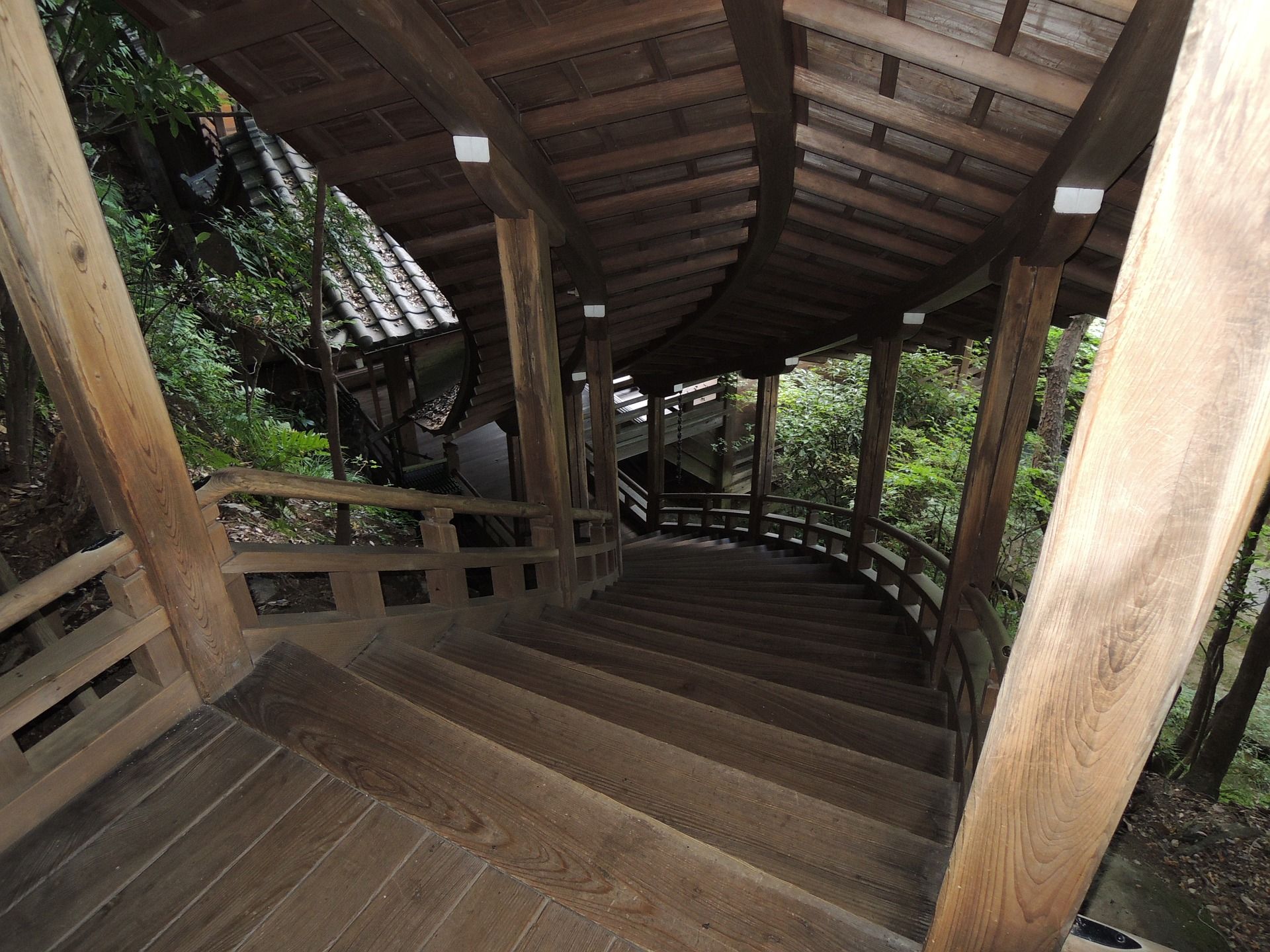 Wooden stairs spiraling down at the Eikando Temple in Kyoto, Japan