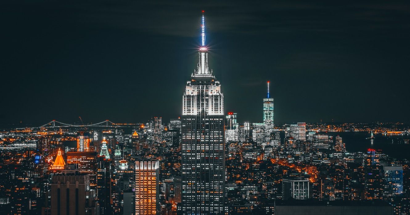 A view of the Empire State Building and the NYC skyline at night, New York City, NY, USA