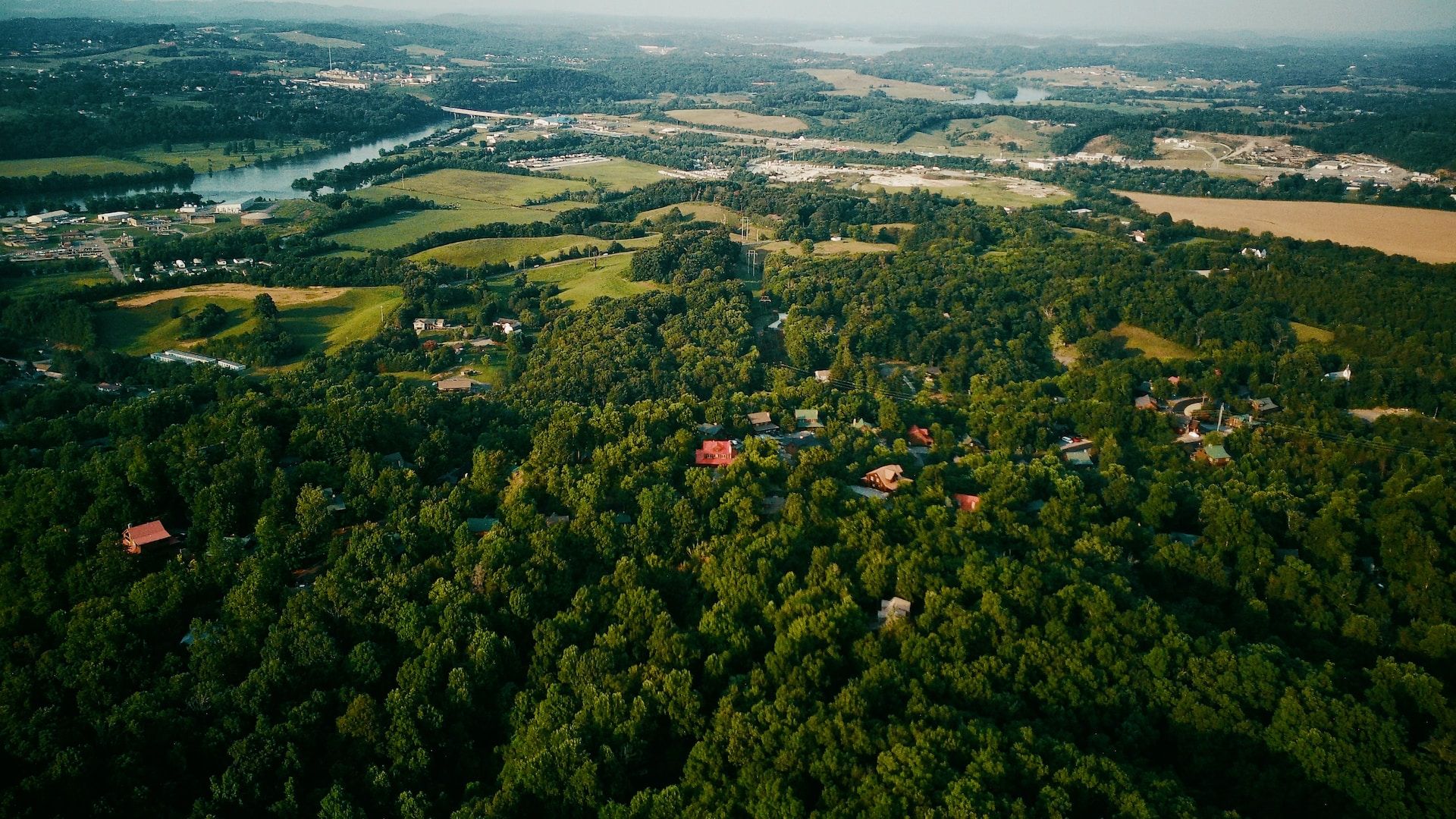 Aerial view of buildings and lush forest in Pigeon Forge, TN, USA