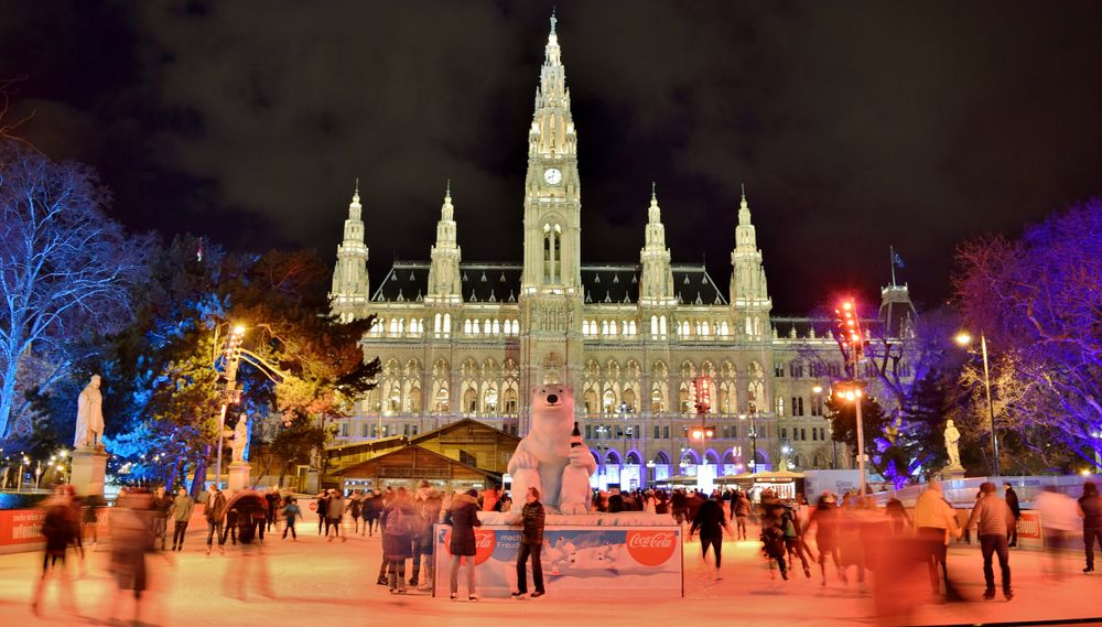 Ice Skating in front of Vienna City Hall at night in December