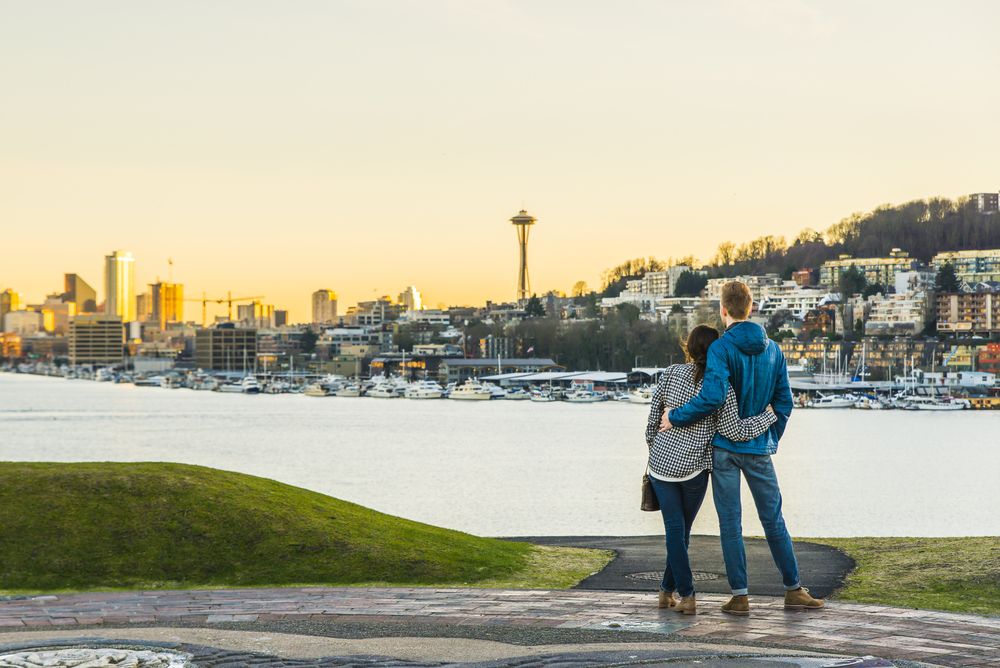 A couple hug and looking Seattle city, Washington