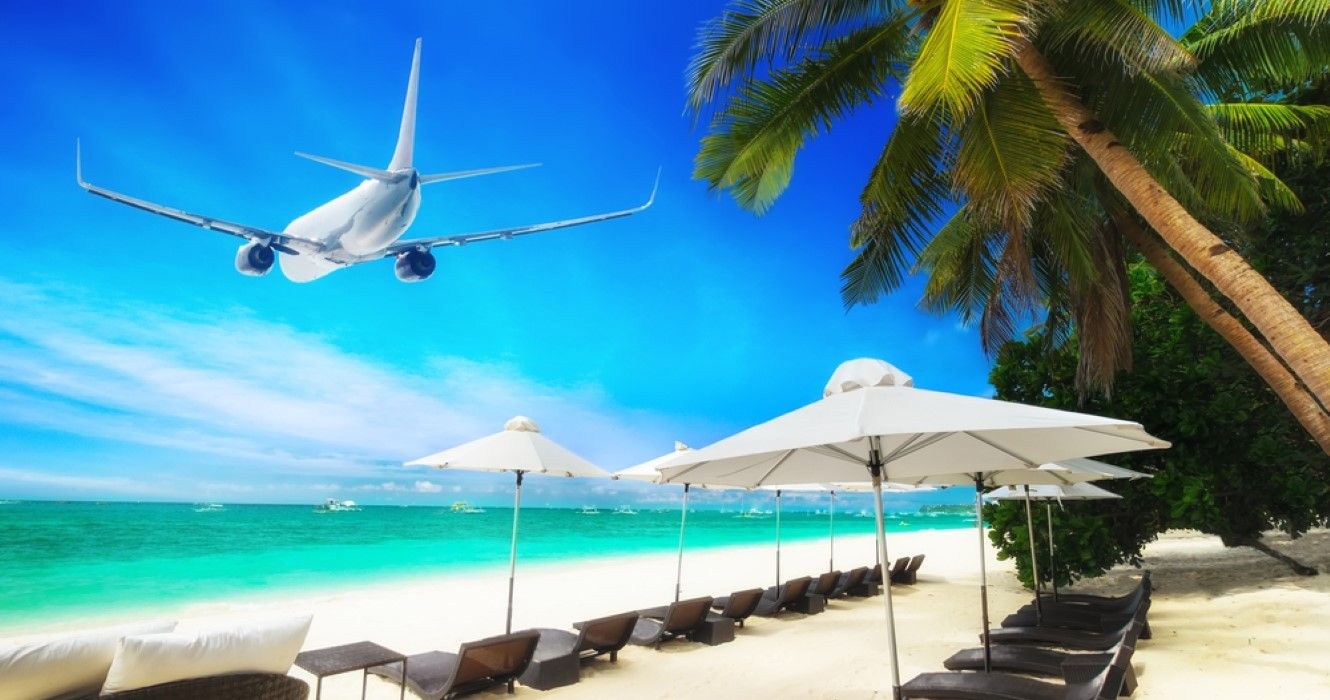 Airplane flying over Boracay Island, The Philippines