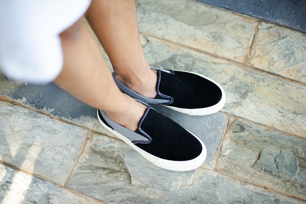 Black and white slip-on shoes