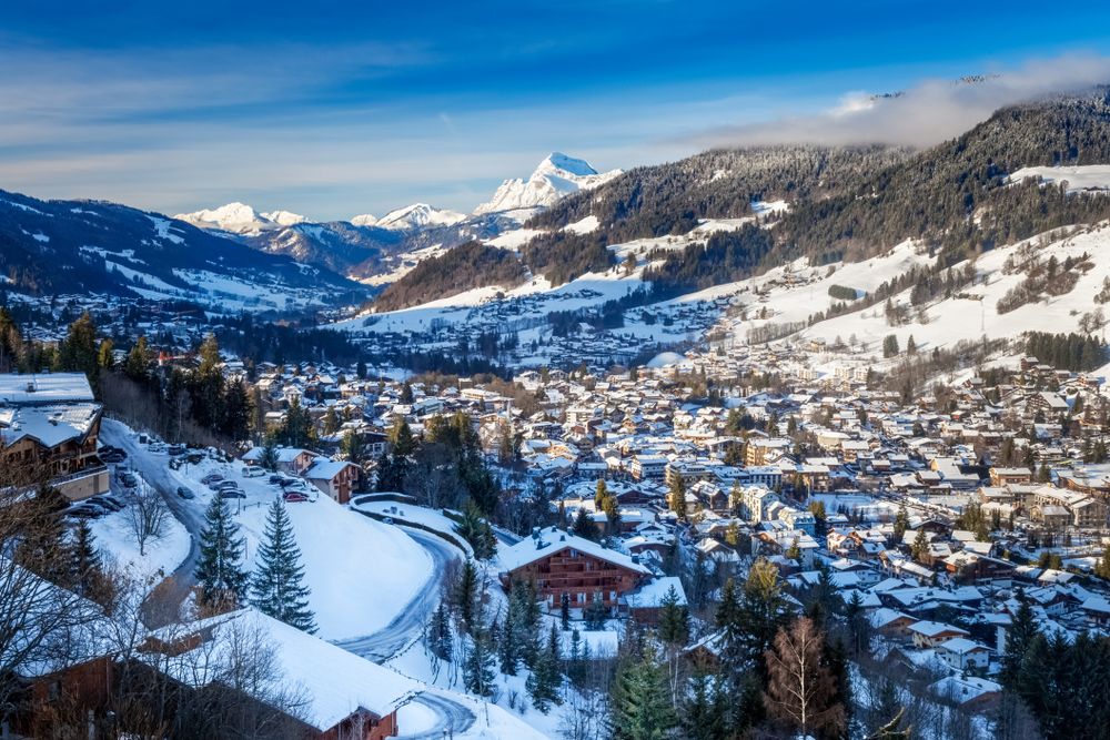 Panoramic view of Megeve (Megève) village and ski resort covered in snow in the winter in the French Alps, France