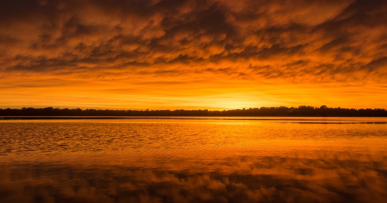 Sunset and turbulent Clouds at White Rock Lake. Dallas, Texas