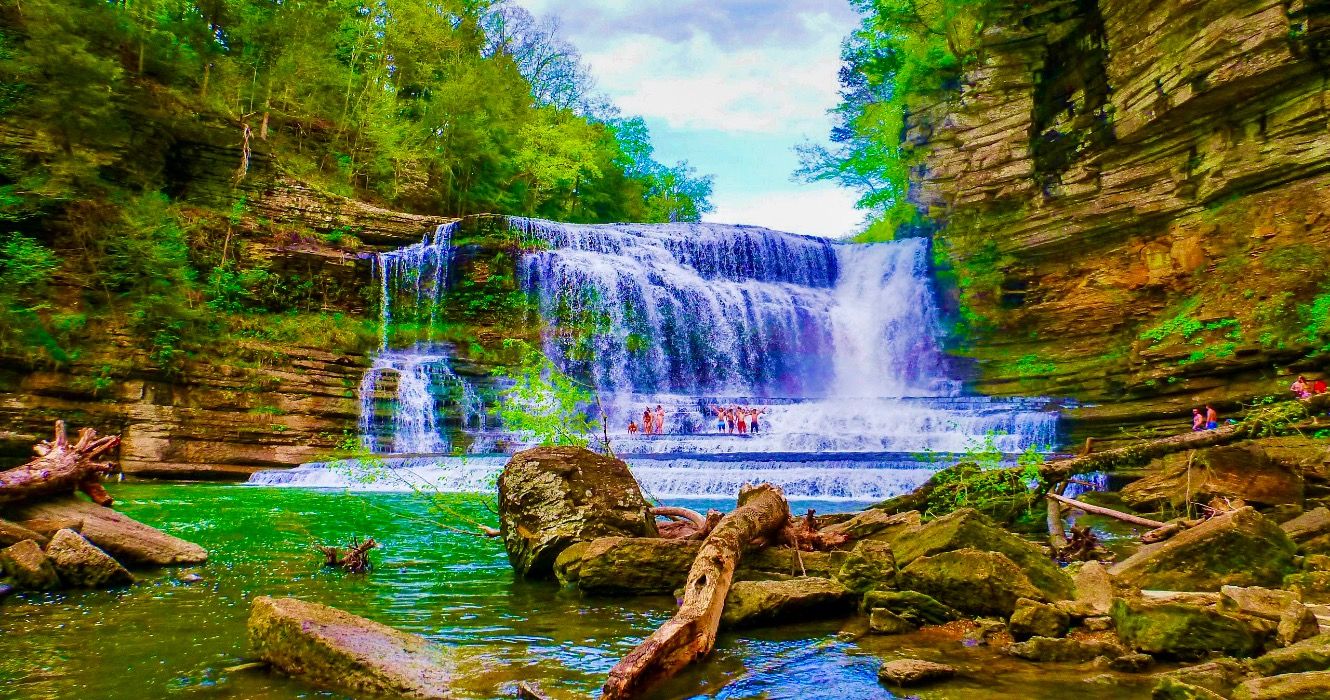 Swimmers and hikers enjoying Cummins Falls, Tennessee