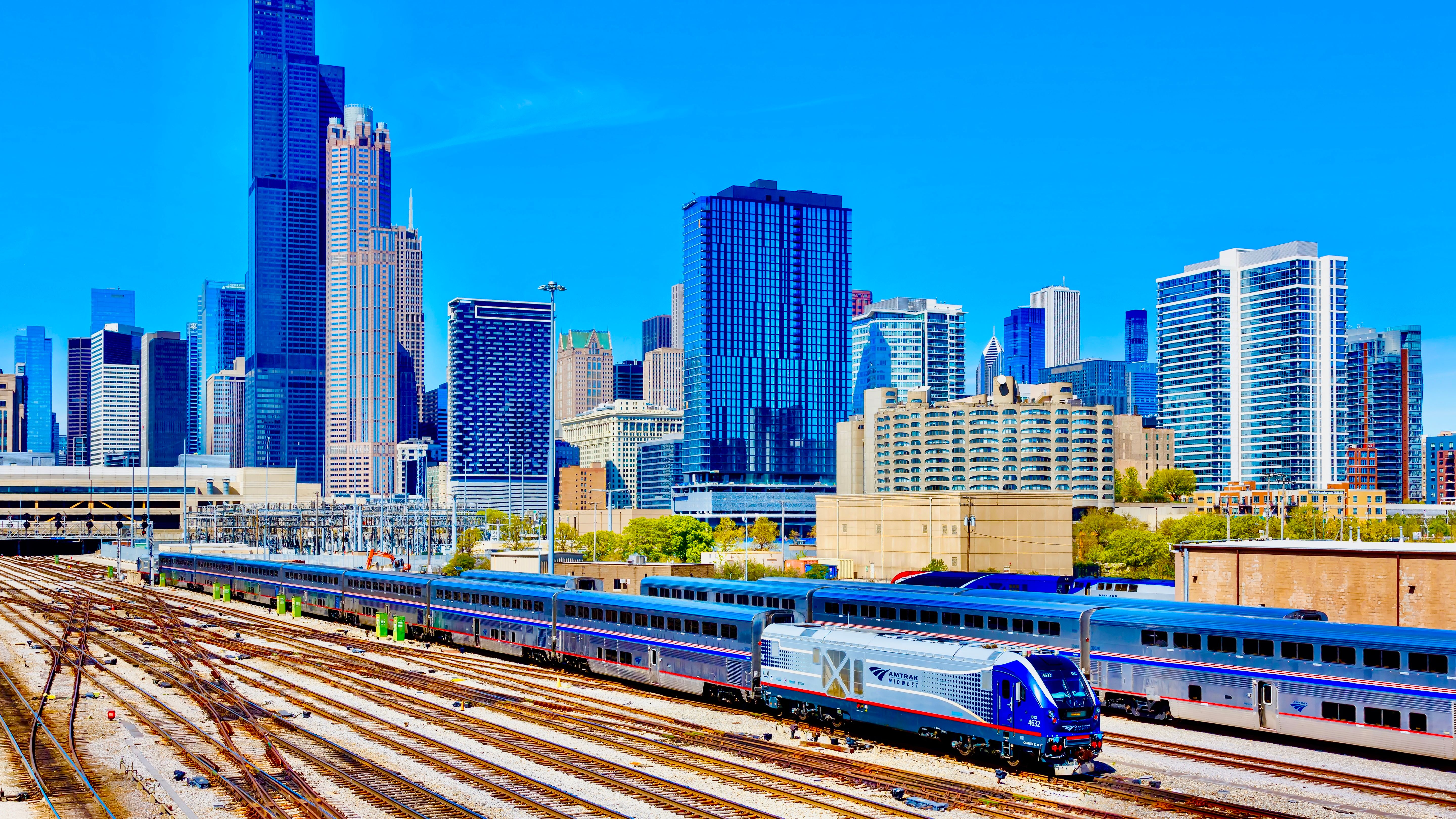 Skyline with Amtrak Midwest passenger train railway near Union Station in Chicago, United States.