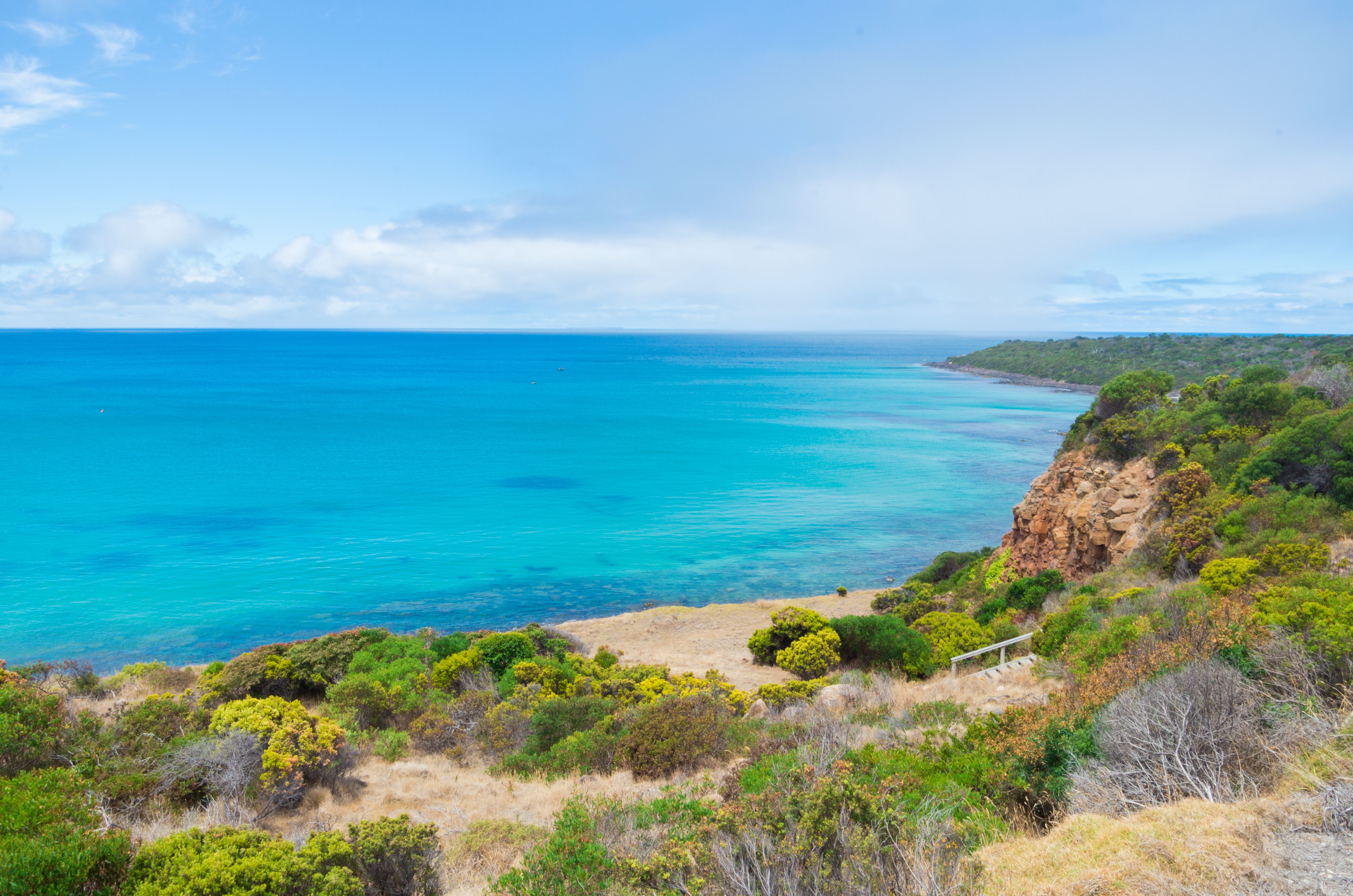 Rocky beach and foreshore cliffs near Portland in Victoria, Australia.