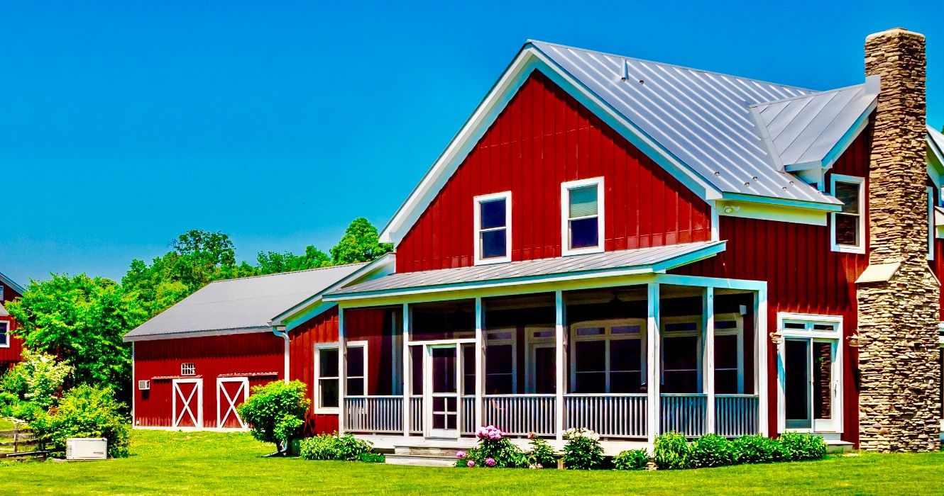 A red farmhouse and barn in Rhinebeck, New York