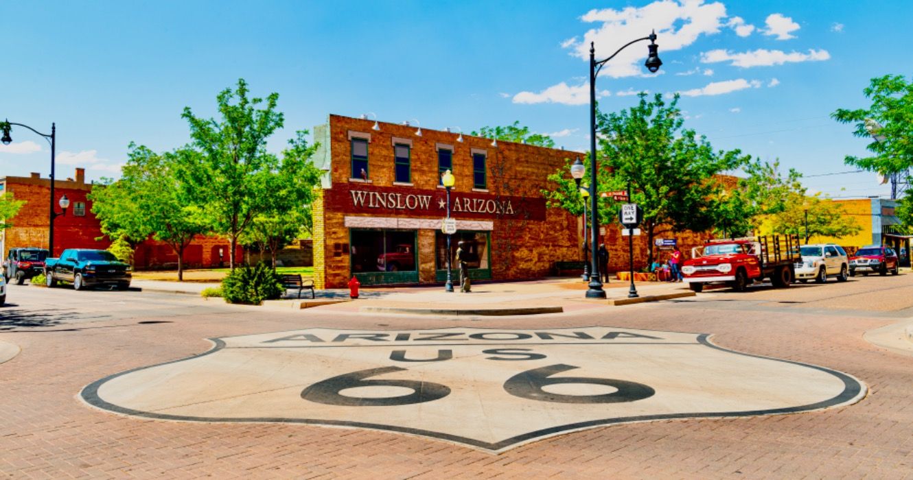 Standing on the corner of Historic Route 66 in winslow Arizona