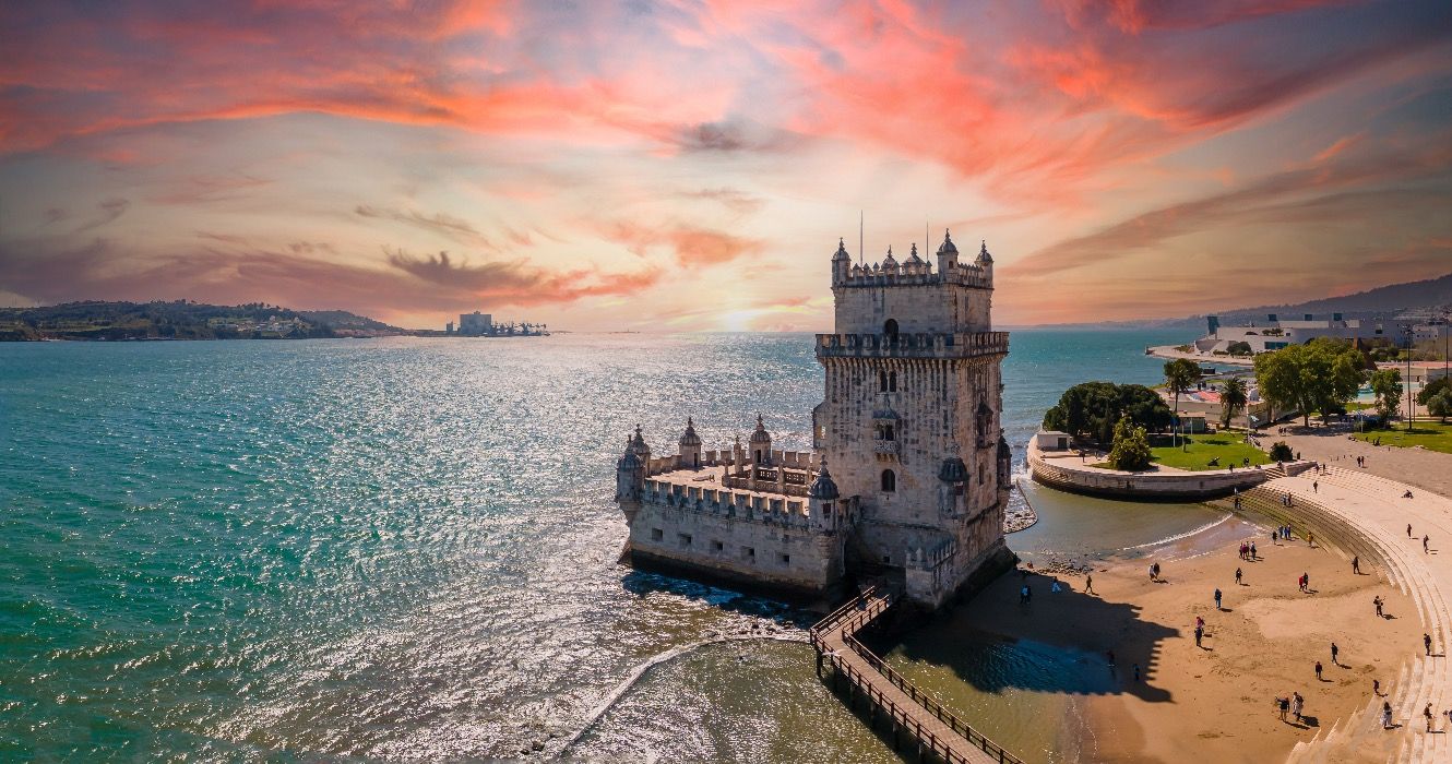 Aerial view of Tower of Belem at sunset, Lisbon, Portugal on the Tagus River.