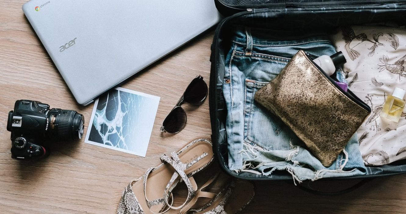 Luggage with personal items, ready for travel 