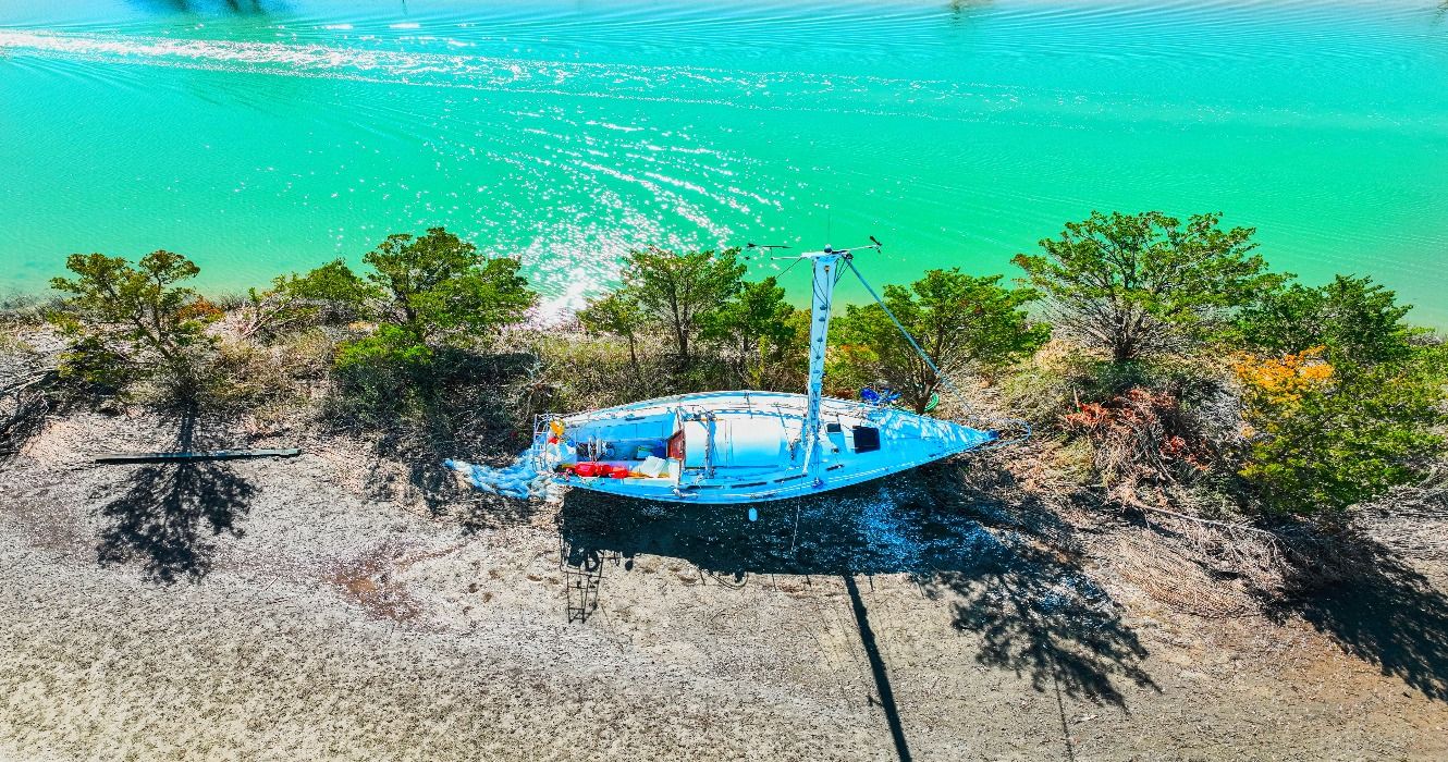 Shipwrecked boat near the turquoise waters of Murrells Inlet in South Carolina, SC, USA
