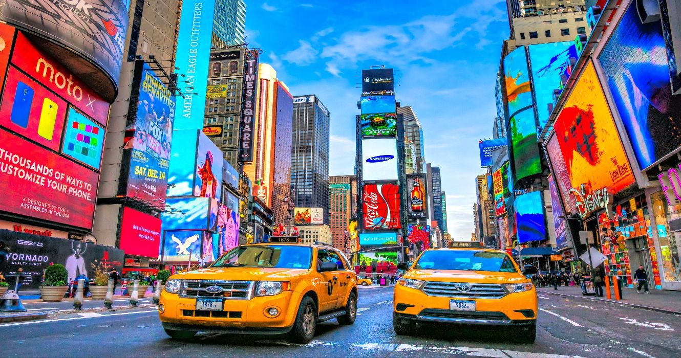 Times Square and NYC taxi cabs during the day in Manhattan, New York City, NY, USA