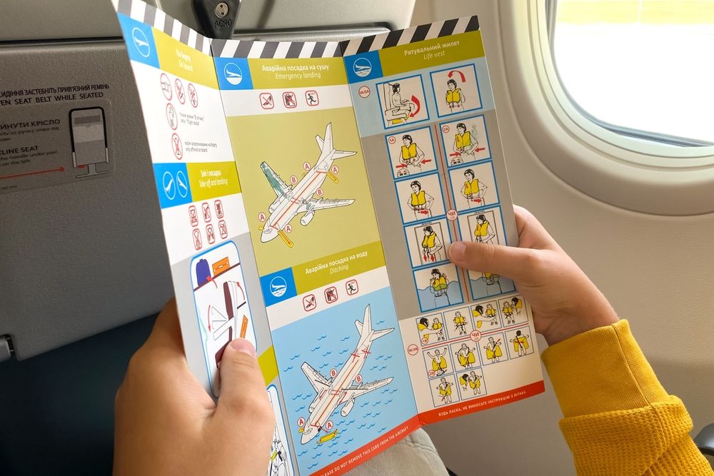 Flight safety brochure on a plane