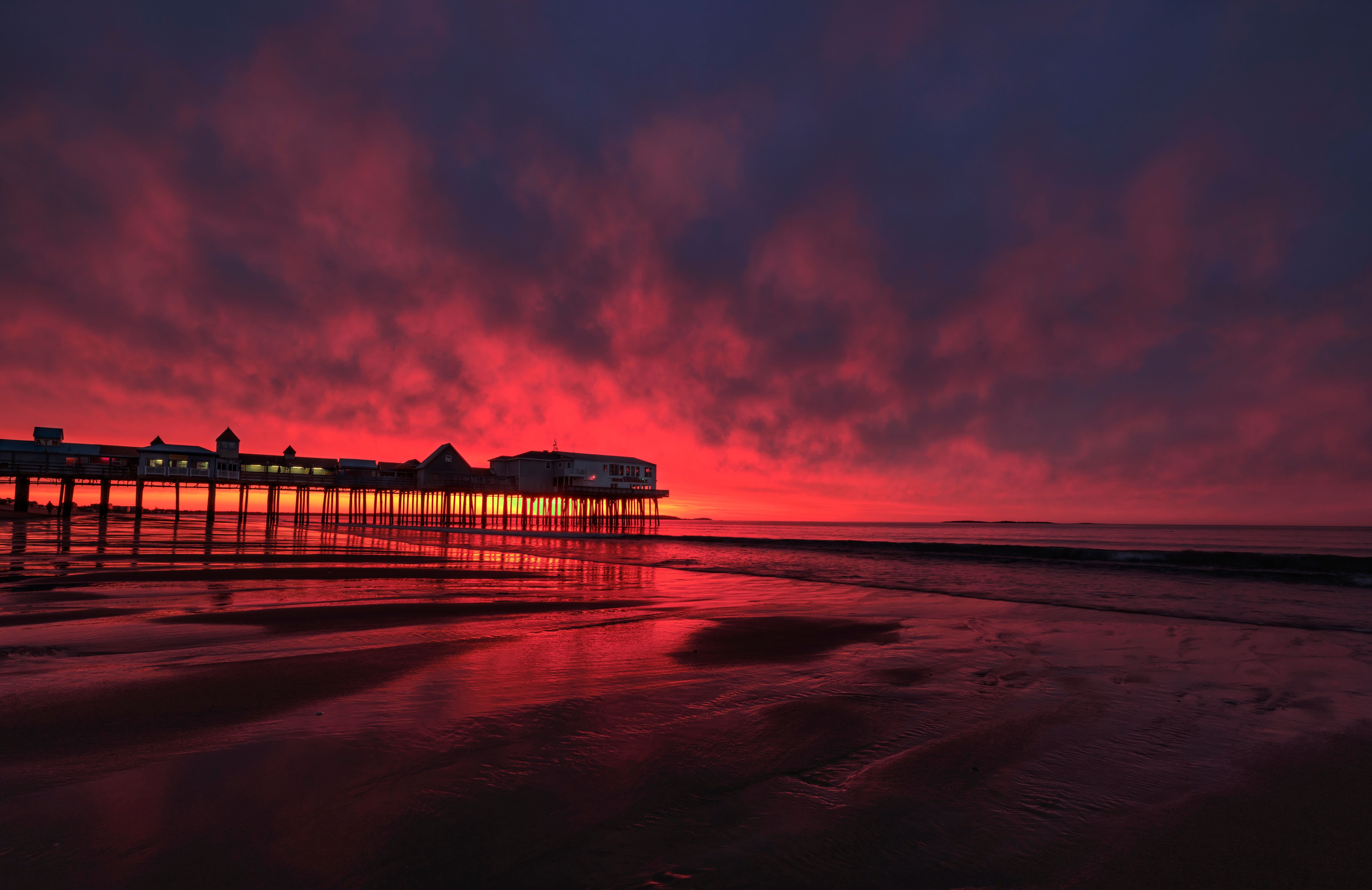 A dramatic sunrise at Old Orchard Beach in Maine