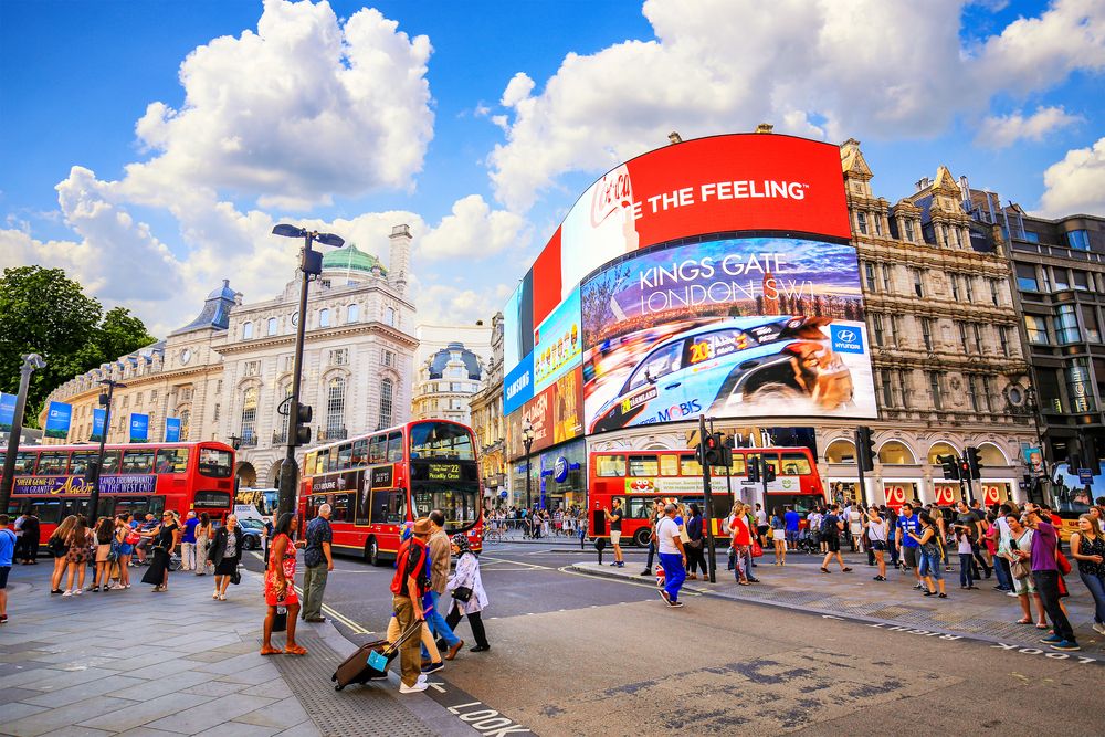 People and traffic at Piccadilly Circus in London's West End, London, England, UK