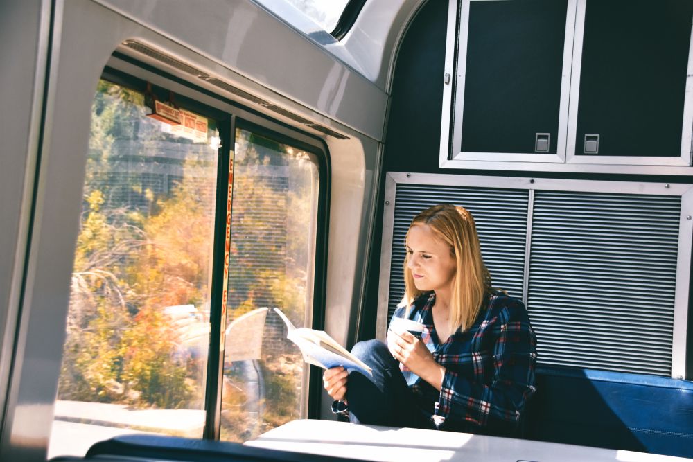 Woman in Amtrak lounge reading