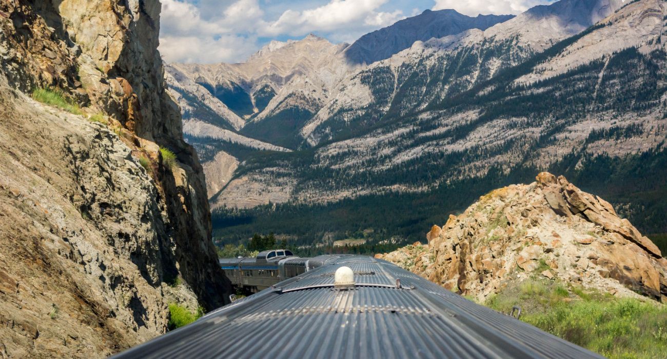 Canadian train traveling through the Rocky Mountains