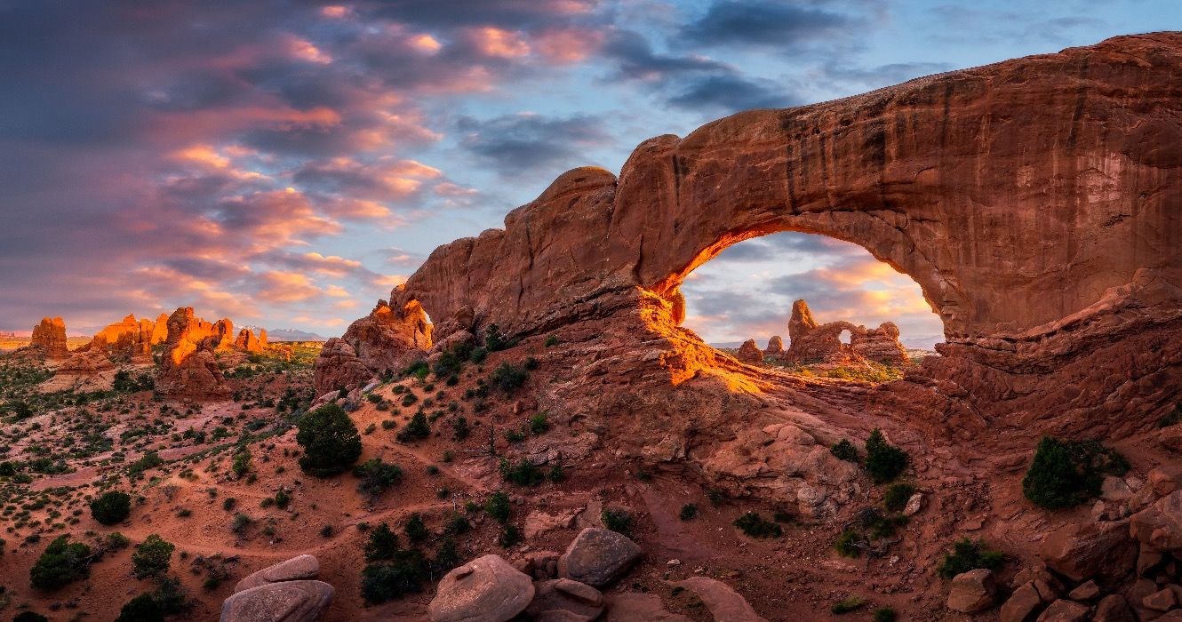Evening light over North Window with Turret Arch in the distance, Arches National Park, Utah