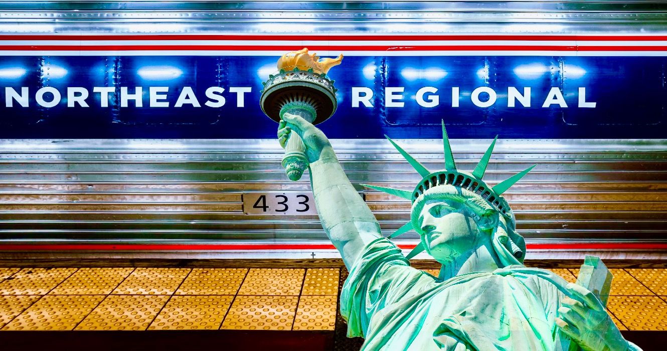 New York train with Statue of Liberty