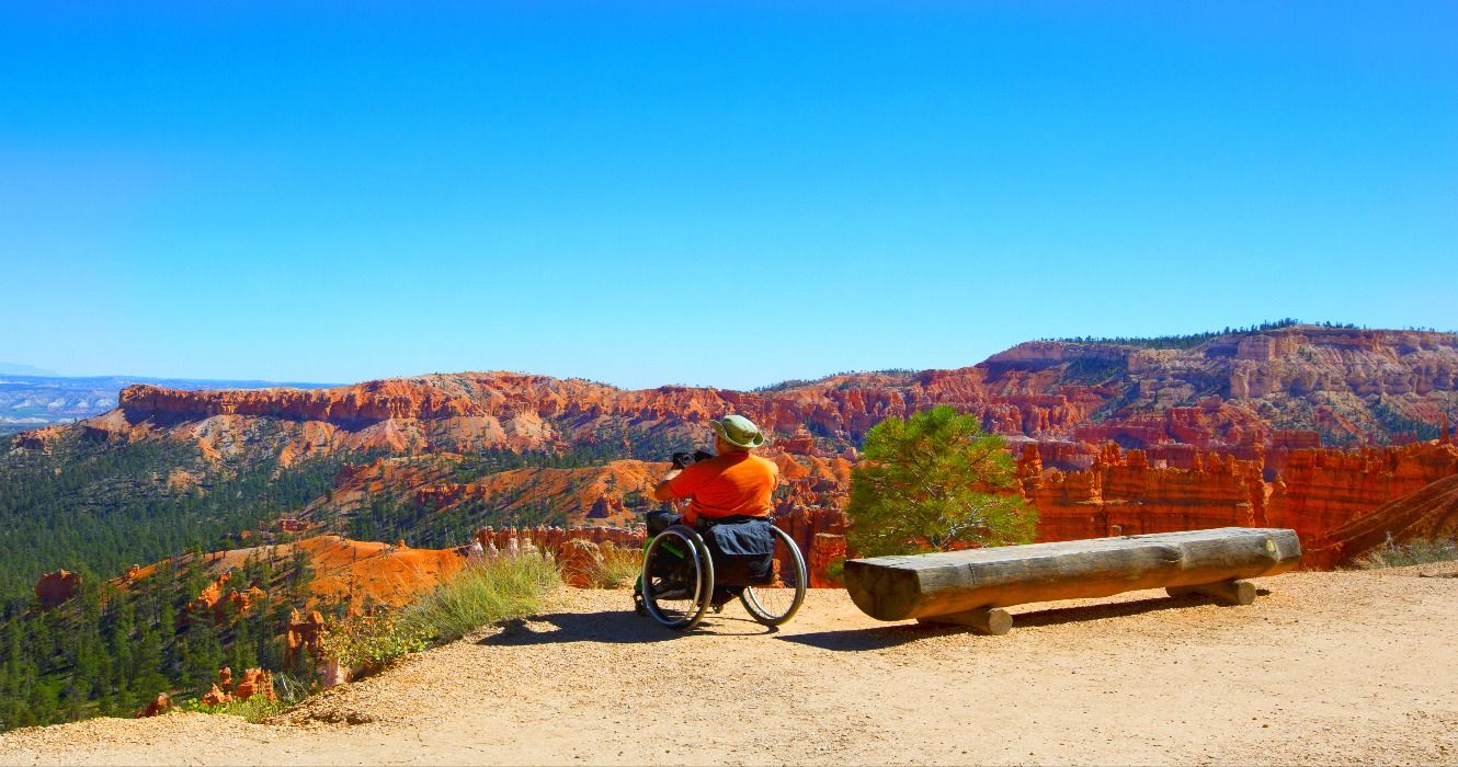 A visitor in a wheelchair at the rim at Bryce Canyon National Park in Utah, UT, USA