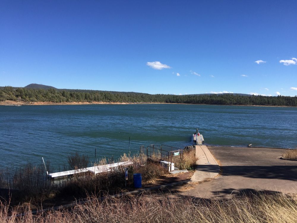 Scenic view of Show Low Lake, accessible via a beautiful beach hike in Arizona