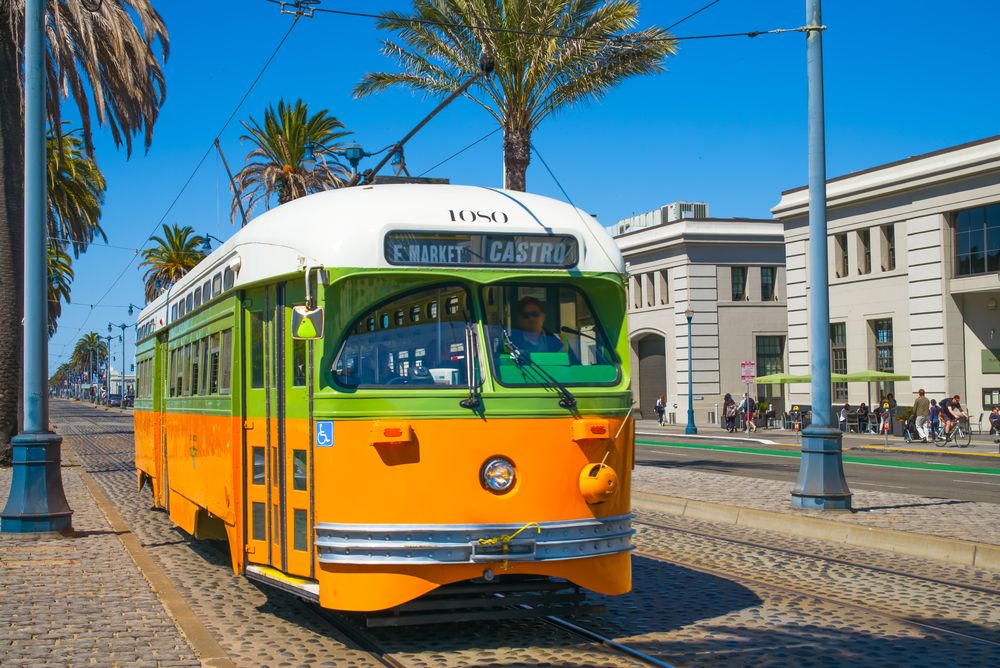 San Francisco streetcar, tram or muni trolley traveling on the Embarcadero in Downtown San Francisco, CA, California, USA