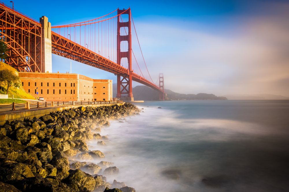 The Golden Gate Bridge seen at sunrise from Fort Point National Historic Site, San Francisco, CA, California, USA