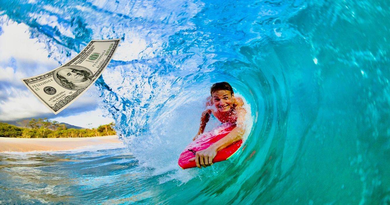 Tourist surfing in Maui, Hawaii