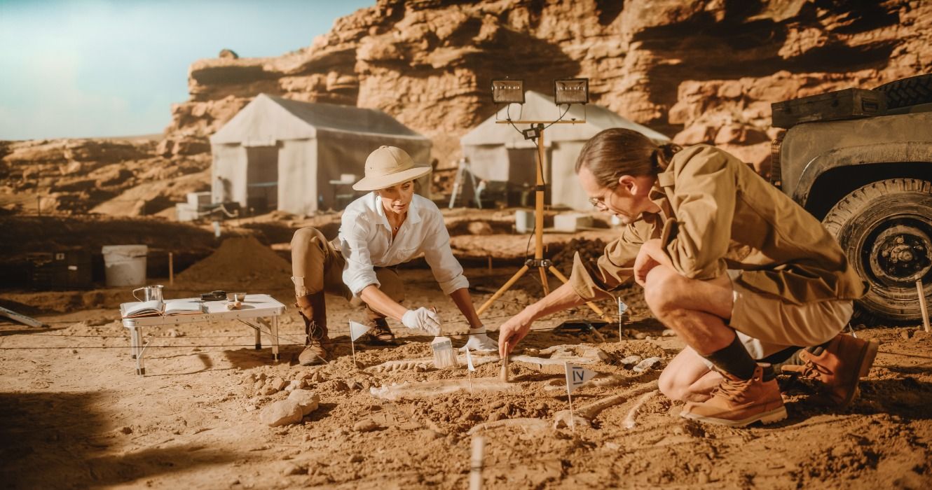 Archeologists working at a dig site during archeological excavations of an ancient site